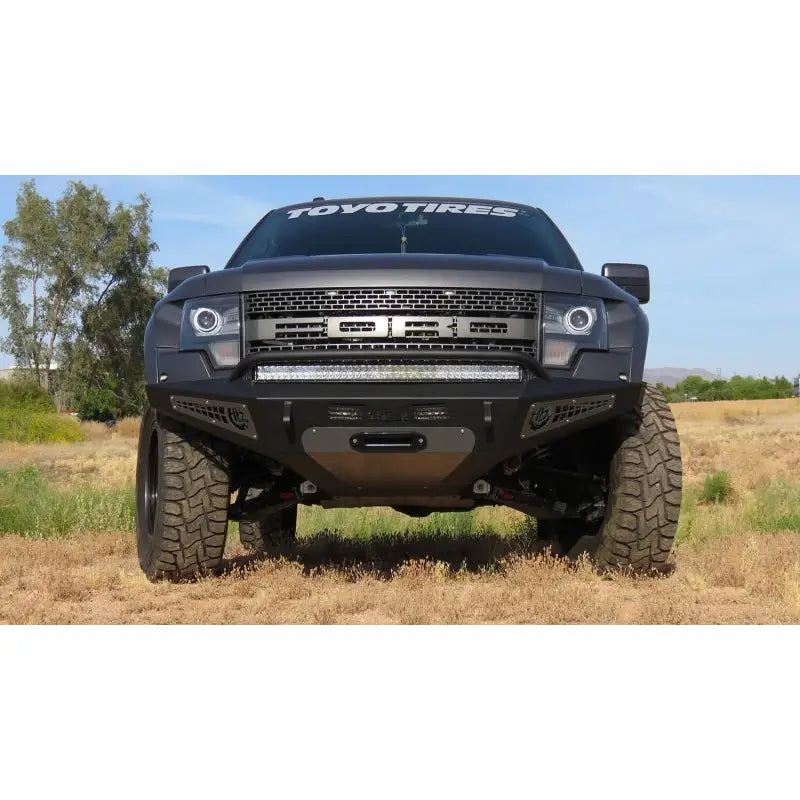 Addictive Desert Designs 10-14 Ford F-150 Raptor HoneyBadger Front Bumper w/ Winch Mount - F017275050103