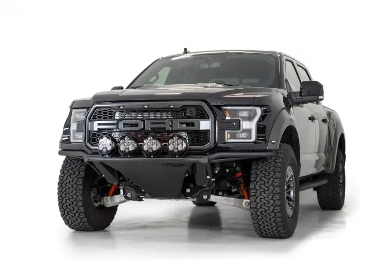 Black Ford Raptor with addictive desert designs light hoop in hammer black finish