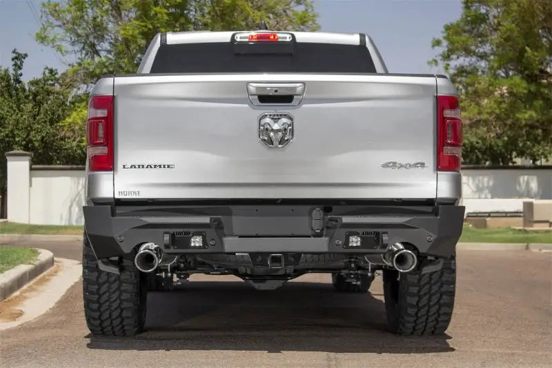 Silver Ram pickup truck rear with Addictive Desert Designs Hammer Stealth Fighter bumper