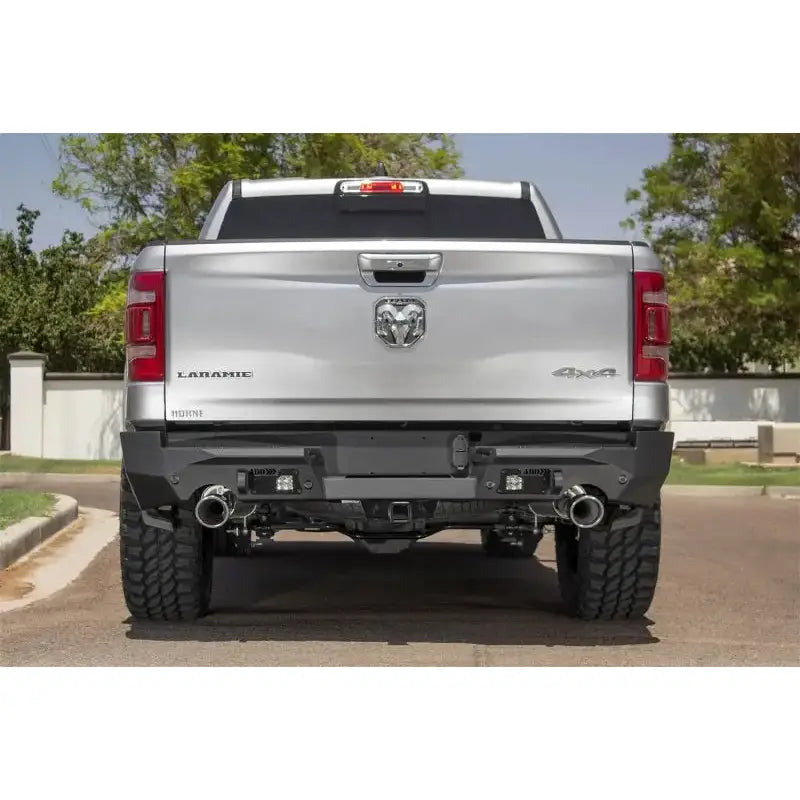 Silver Ram pickup truck rear with Addictive Desert Designs Hammer Stealth Fighter bumper