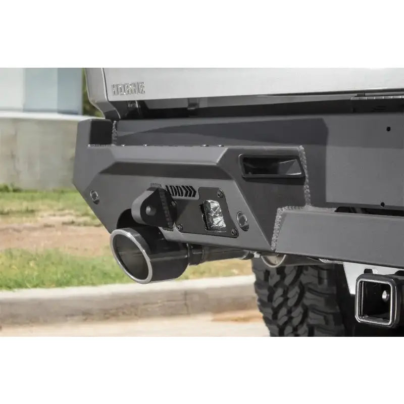 Gray truck rear bumper with exhaust pipe for Addictive Desert Designs Hammer Stealth Fighter
