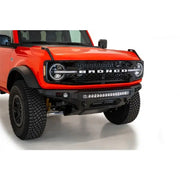 Addictive Desert Designs 2021+ Ford Bronco Stealth Fighter Front Bumper with Winch Mount featuring a 30-inch LED light bar in Hammer Black with Satin Black panels