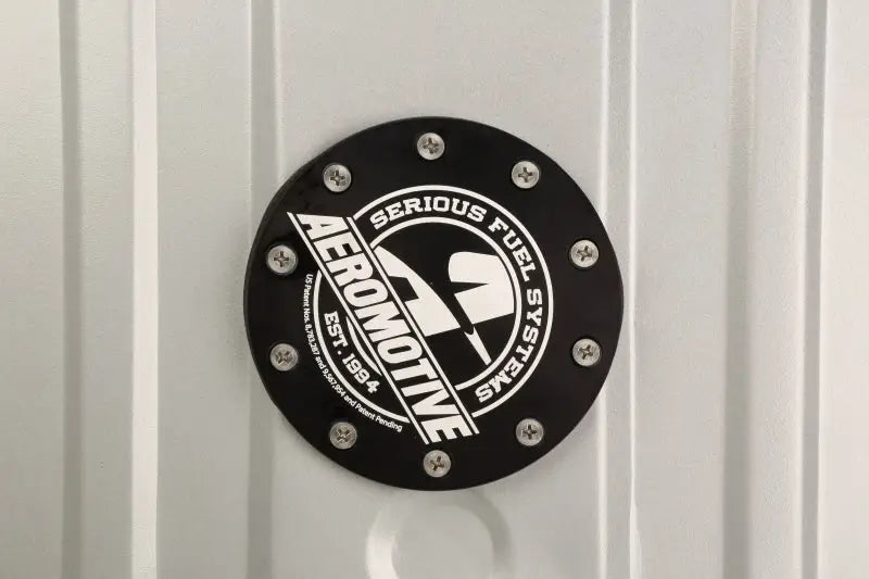 Black circular fuel system component for Aeromotive 55-57 Chevrolet Stealth Gen 2 fuel tank