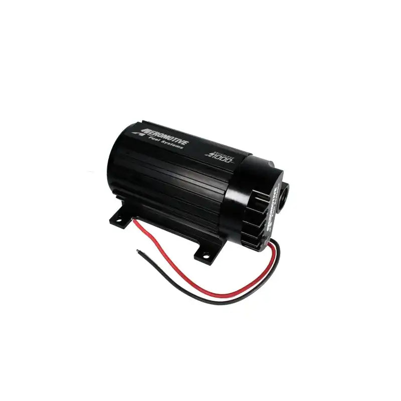 Black Aeromotive A1000 fuel pump with red and black wires in a close-up shot