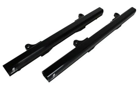 Two black Aeromotive Fuel Rail Ford 5.0L 4V for high-performance fuel delivery
