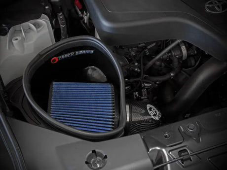 Blue air filter inside black housing for aFe BMW Z4 Track Series cold air intake system