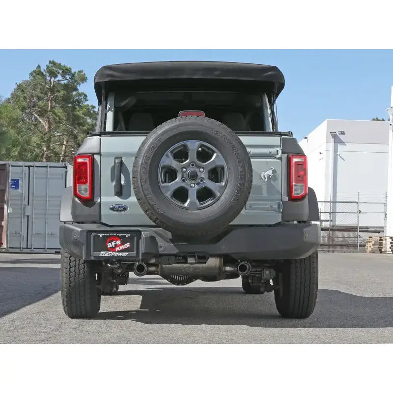 Gray Ford Bronco with rear-mounted spare tire and aFe Vulcan Cat-Back stainless steel
