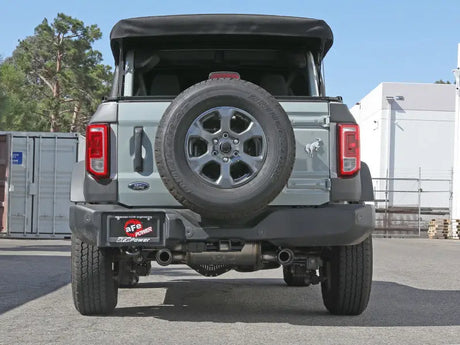 Gray Ford Bronco with rear-mounted spare tire and aFe Vulcan Cat-Back stainless steel