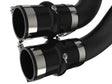 Black rubber hoses with metal clamps on aFe BladeRunner 2.5in Aluminum Hot Charge Pipe