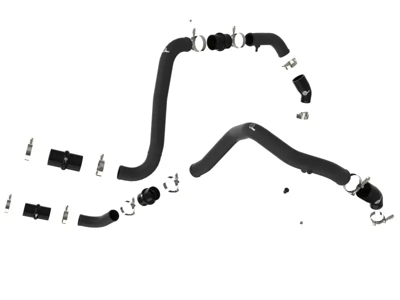 Black rubber automotive hoses with metal clamps on a hot charge pipe for Ford F-150 Raptor