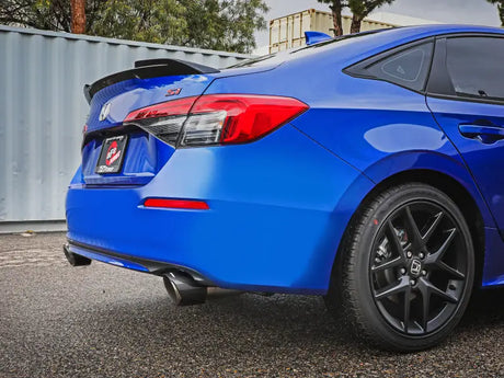 Blue Honda Civic with aftermarket cat-back exhaust w carbon fiber tips for enhanced sound