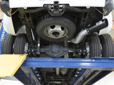 Truck undercarriage with spare tire and exhaust showing afe atlas aluminized steel exhaust system