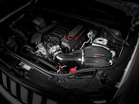 Car engine with carbon fiber air intake on aFe Black Series Cold Air Intake WK2 Jeep SRT-8