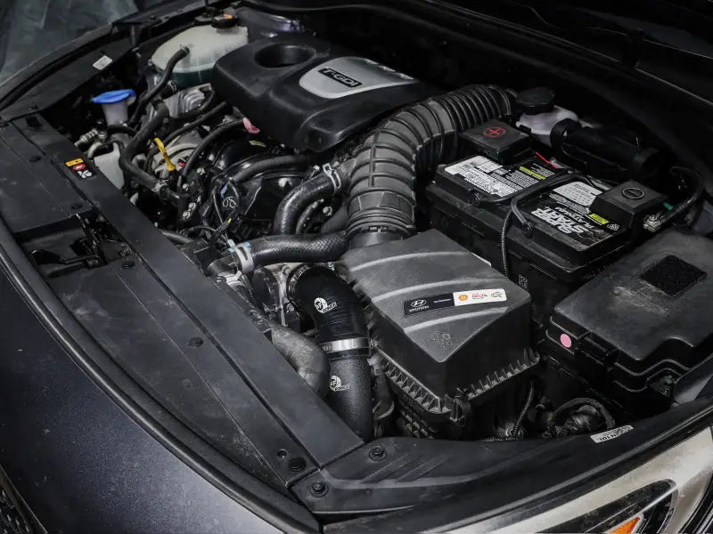 Car engine compartment with aFe BladeRunner cold charge pipe for Hyundai Elantra GT