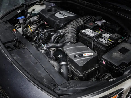 Car engine compartment with aFe BladeRunner cold charge pipe for Hyundai Elantra GT
