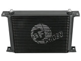 Black rectangular oil cooler from aFe Bladerunner auto transmission oil cooler kit for Silverado