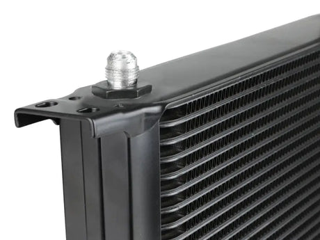 Black transmission cooler with silver fitting from aFe Bladerunner oil cooler kit for Silverado