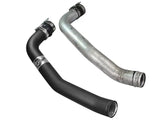 Two curved pipes with hose clamps for afe bladerunner intercoolers on Ford F-250 F-350