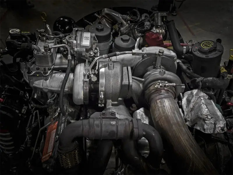 Complex diesel engine assembly for aFe BladeRunner Street Series turbocharger on Ford V8-6.4L trucks