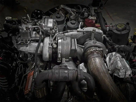 Complex diesel engine assembly for aFe BladeRunner Street Series turbocharger on Ford V8-6.4L trucks