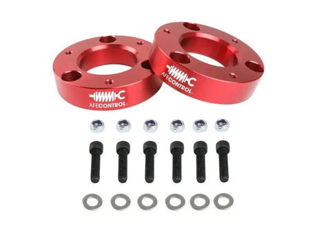 Red aluminum leveling kit for Ford F-150 by aFe CONTROL 2.0 IN; perfect for leveling upgrades