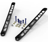 Black metal suspension arms with blue bolts for Toyota GR Supra strut brace upgrade