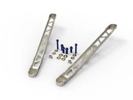 Silver lightweight suspension control arms with blue bolts for Toyota GR Supra suspension strut brace