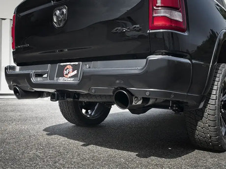 Black truck rear with dual exhaust showcasing aFe Gemini XV 3in cat-back exhaust system