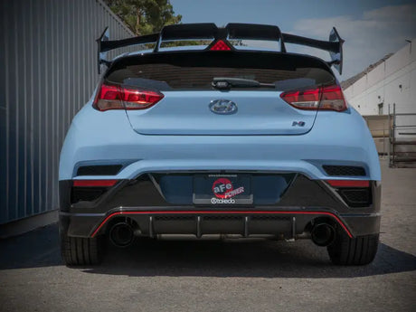 Light blue Hyundai Veloster with Takeda cat-back exhaust and aftermarket spoiler