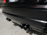 Black car’s exhaust pipes with stainless steel tips from aFe Mach ForceXP system on BMW M3