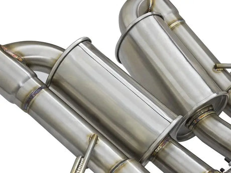 Shiny metal exhaust system with carbon fiber tips on aFe MachForce XP Axle Back Chevy Corvette Z06