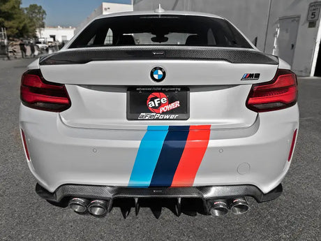 White BMW M2 Competition with carbon fiber accents, afe machforce xp exhausts included