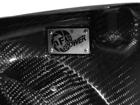 Rectangular metal aFe Power badge on afe magnum force intake system for BMW M5