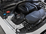 BMW engine compartment with afe power momentum GT Pro dry S intake system installed