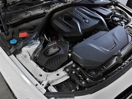 BMW engine compartment with afe power momentum GT Pro dry S intake system installed