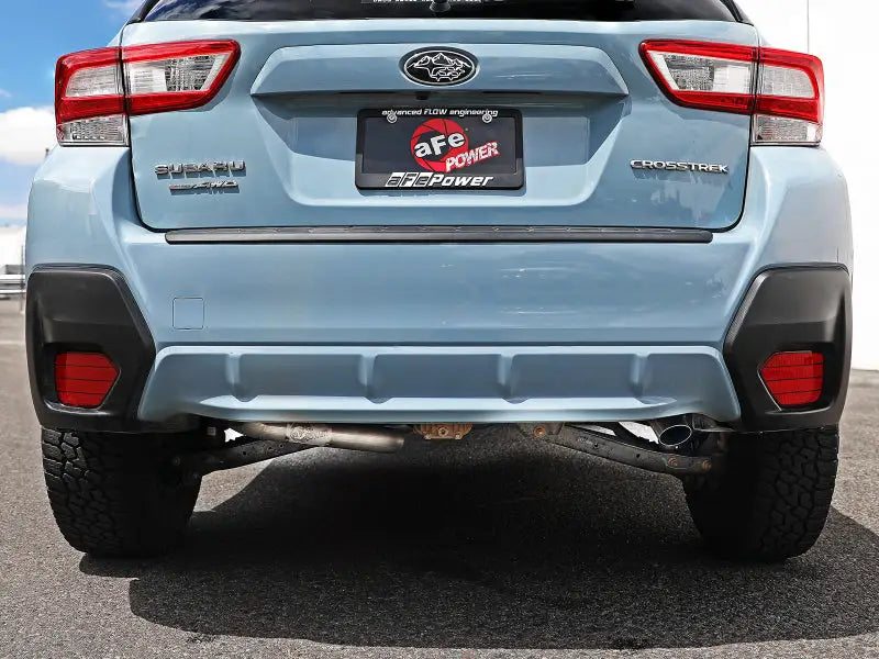 Rear view of Subaru Crosstrek 18-19 equipped with aFe POWER Takeda 2.5in 304 SS cat-back exhaust system.