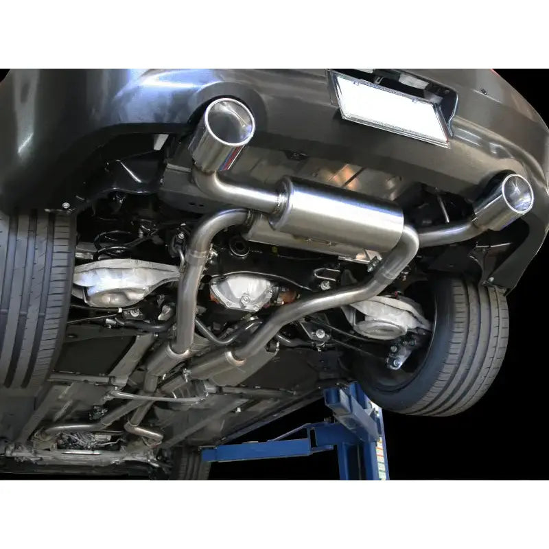 aFe Takeda 2-1/2in 304SS Cat-Back Exhaust System with Polished Tips installed on Infiniti G37/Q60, showcasing dual mufflers and mandrel bent stainless steel for optimized performance.