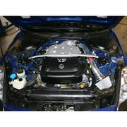 aFe Takeda Stage-2 PDS AIS polished cold air intake setup installed in Nissan 350Z 03-06 V6 engine bay.