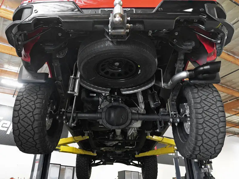Truck undercarriage with afe vulcan series 3in exhaust cat-back on 2019 Silverado