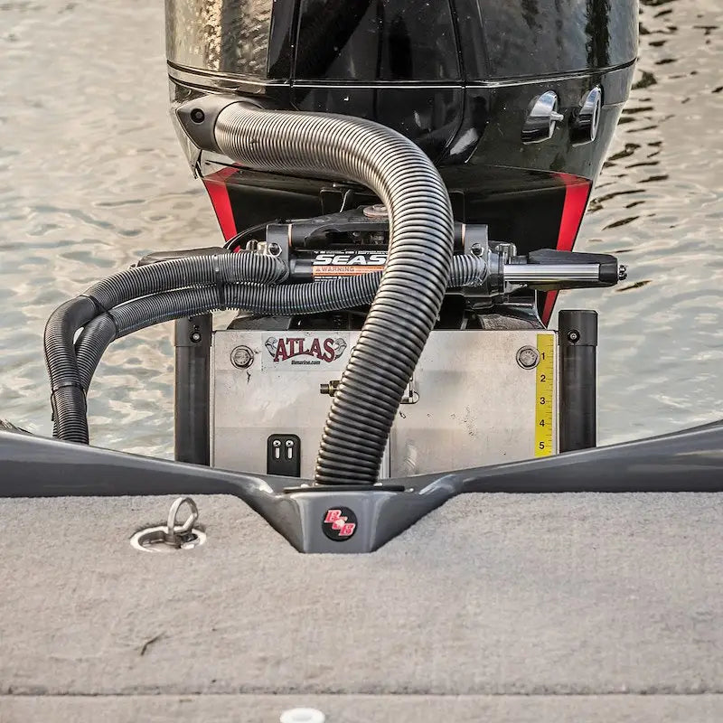 Heavy duty T-H Marine Atlas 4 jack plate with black outboard motor