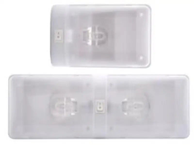 Two clear emergency lights with ail21bp optronics lens in euro white color