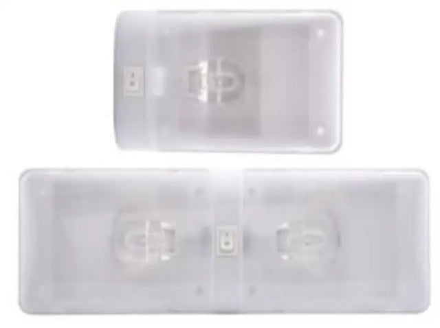 Two clear emergency lights with ail21bp optronics lens in euro white color