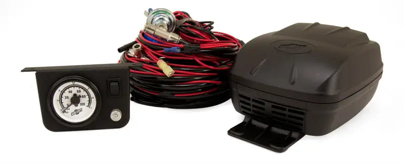 Air Lift Load Controller II - Single Gauge with wiring harness and air compressor for light to medium-duty vehicles offering easy air spring adjustment.
