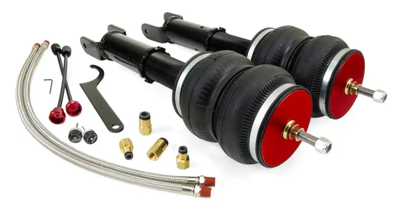 Air Lift Performance 2014+ Infiniti Q50 RWD/AWD Rear Kit components showing air springs, shocks, and installation accessories.