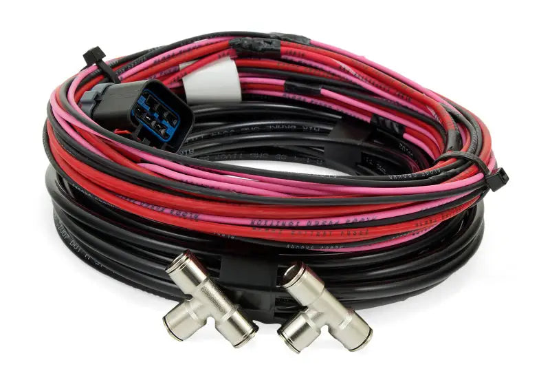 Coiled black and colored electrical wires with connector and T-fittings for Air Lift Wireless One
