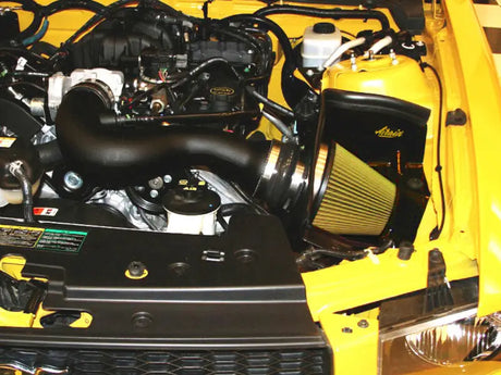 Yellow car engine compartment.