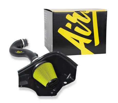 Black air intake system with yellow filter.