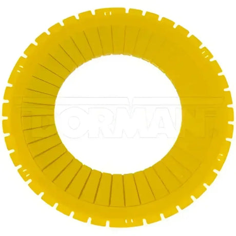 Yellow plastic slotted ring from AK901660PR Dorman alignment shim for precise fitting