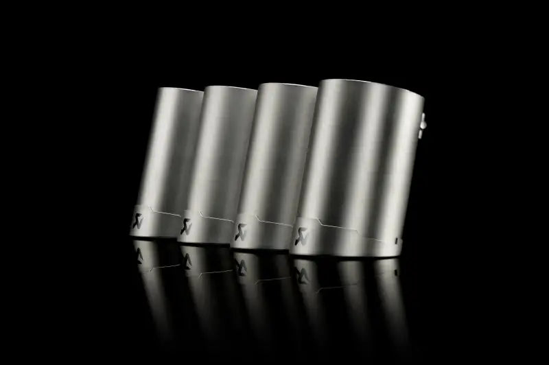 Four brushed metal exhaust tips from the Akrapovic tail pipe set for BMW M3 E90