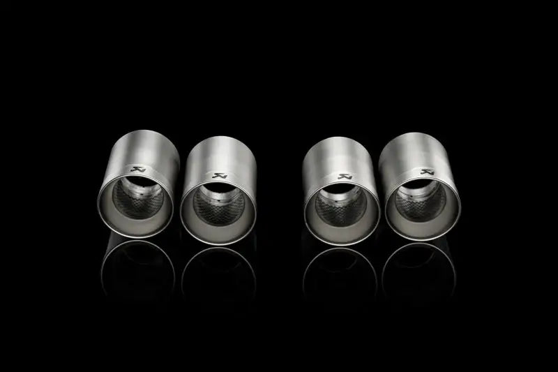 Four titanium exhaust tips from Akrapovic tail pipe set for BMW M3 E90